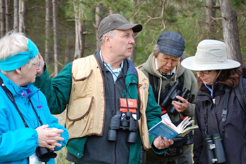 Carl R with birders by Mike Caterino